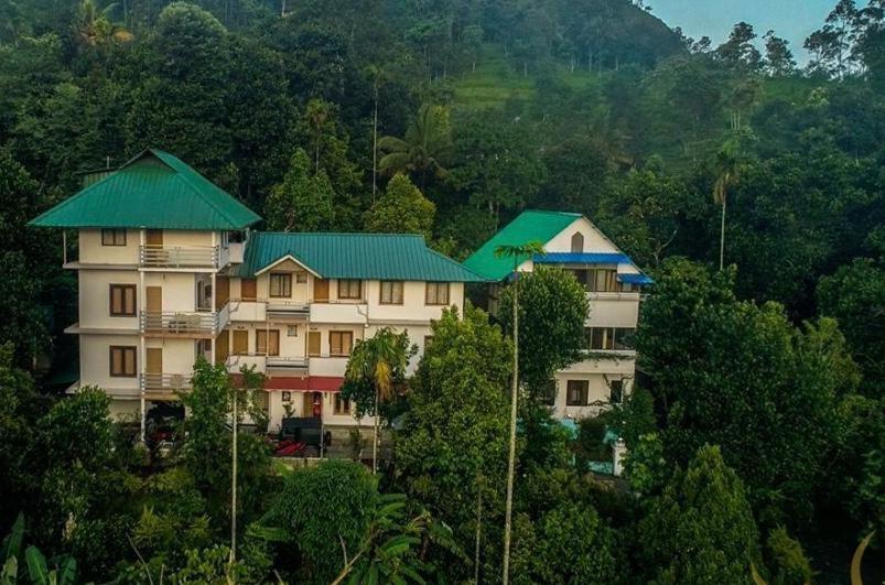 Bell Vedera Resort Munnar Bagian luar foto