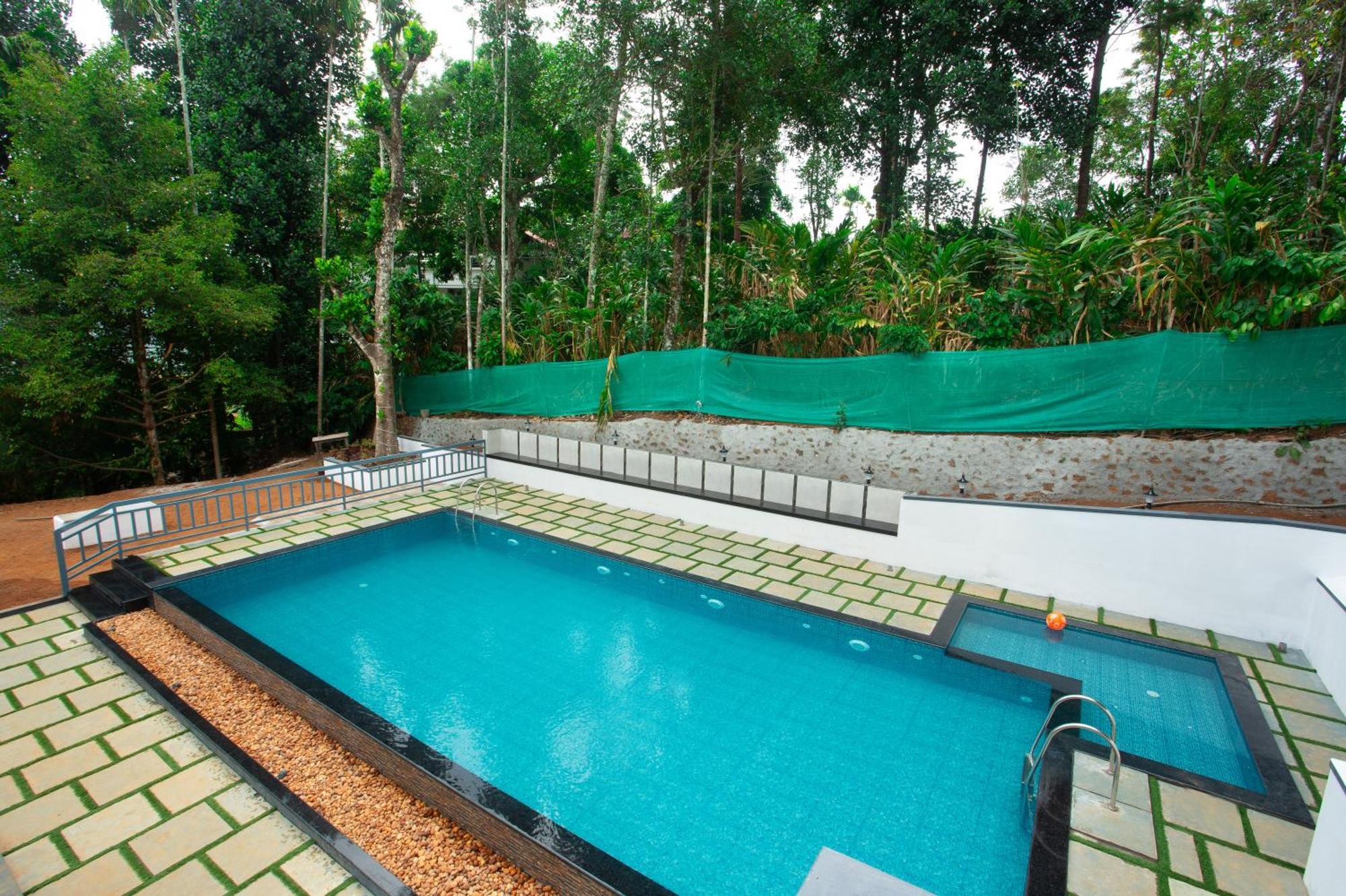 Bell Vedera Resort Munnar Bagian luar foto